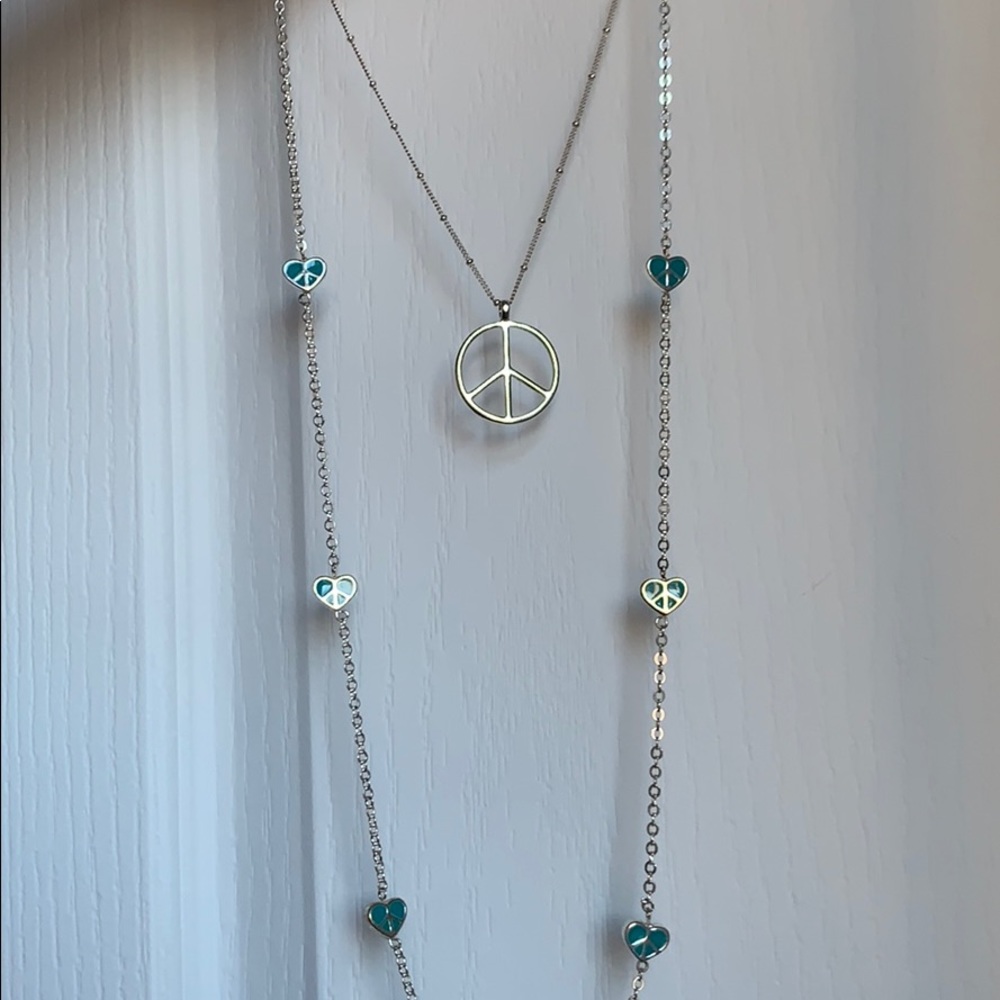FREE‼️ 2 Silver Peace Necklaces